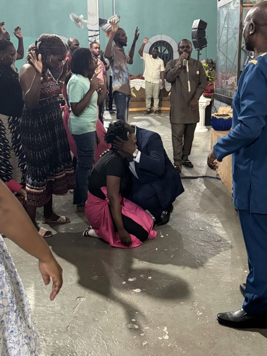 People kneeling in prayer